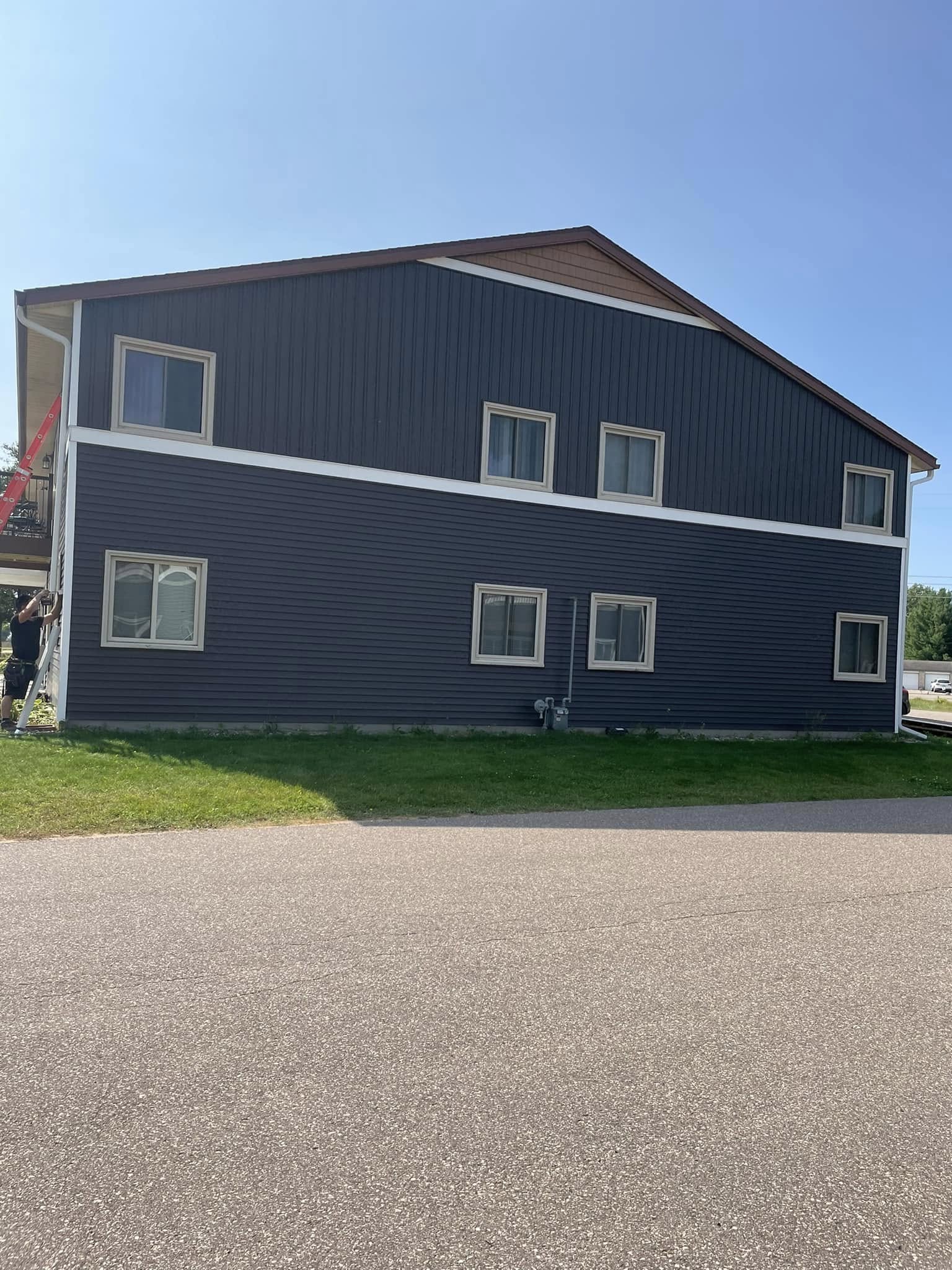 apartments with blue siding installation