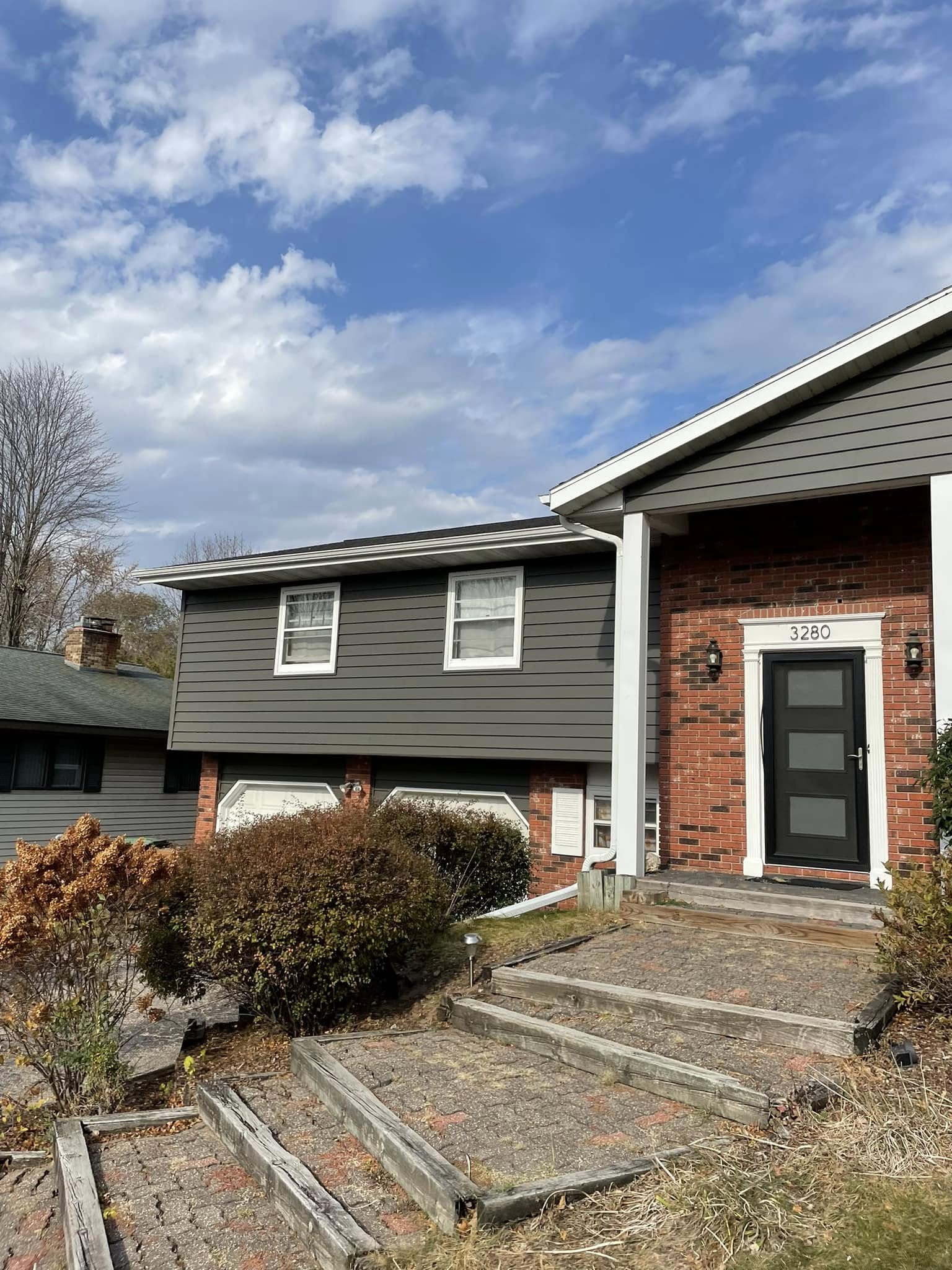 home with recently installed vinyl siding
